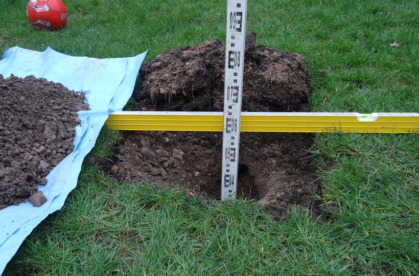 Measuring clean soil depth
